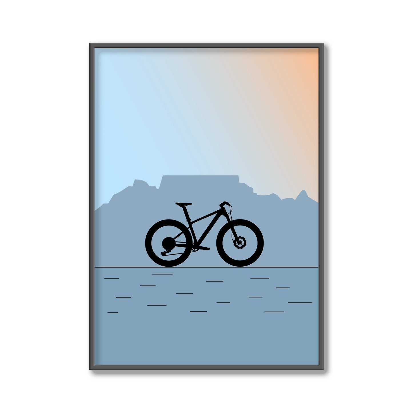 Framed artwork with a mountain bike silhouette against Table Mountain.