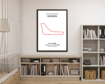 Framed poster of a red racing line drawing on a wall above a bookshelf.